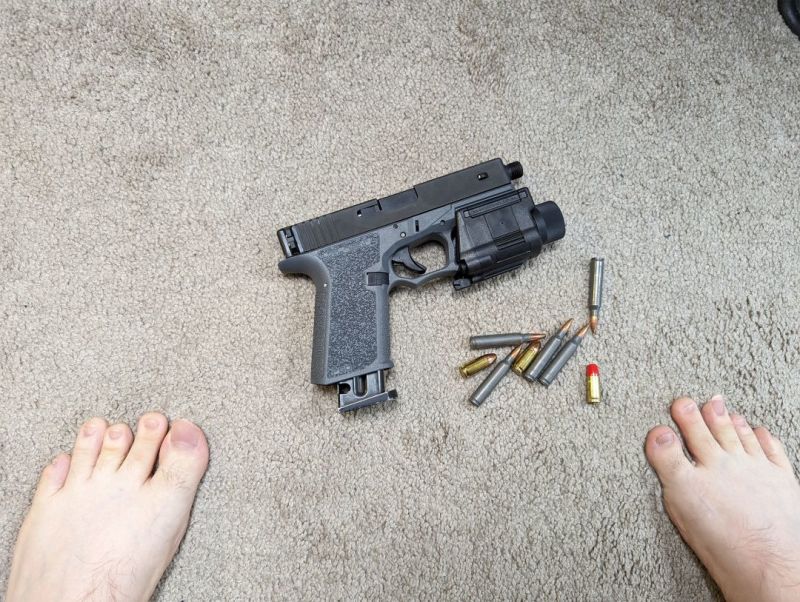 Glok with laser and bullet