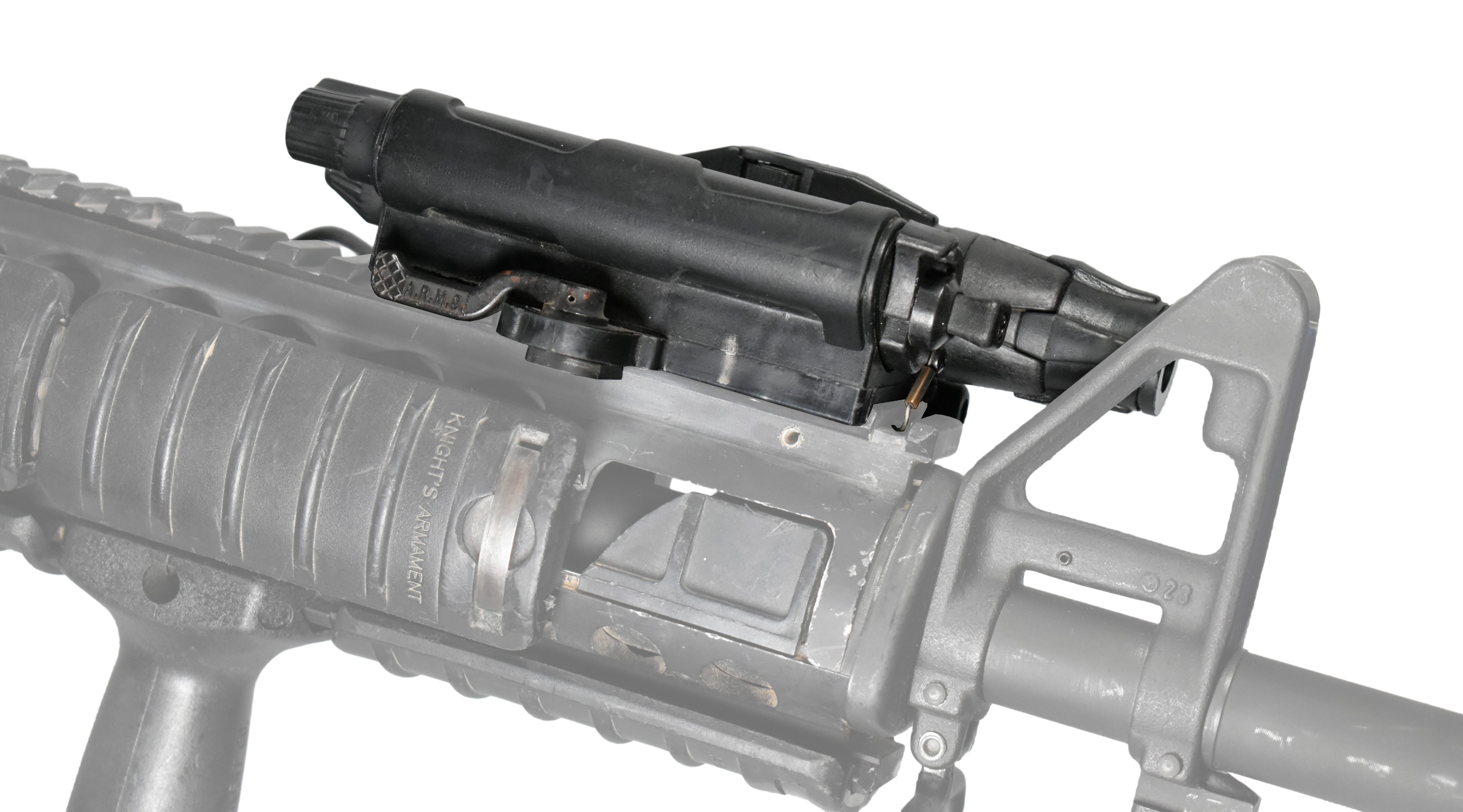 A Variable Intensity Tactical Illuminating Laser (VITAL-2) mounted on a firearm, showcasing its design and features.